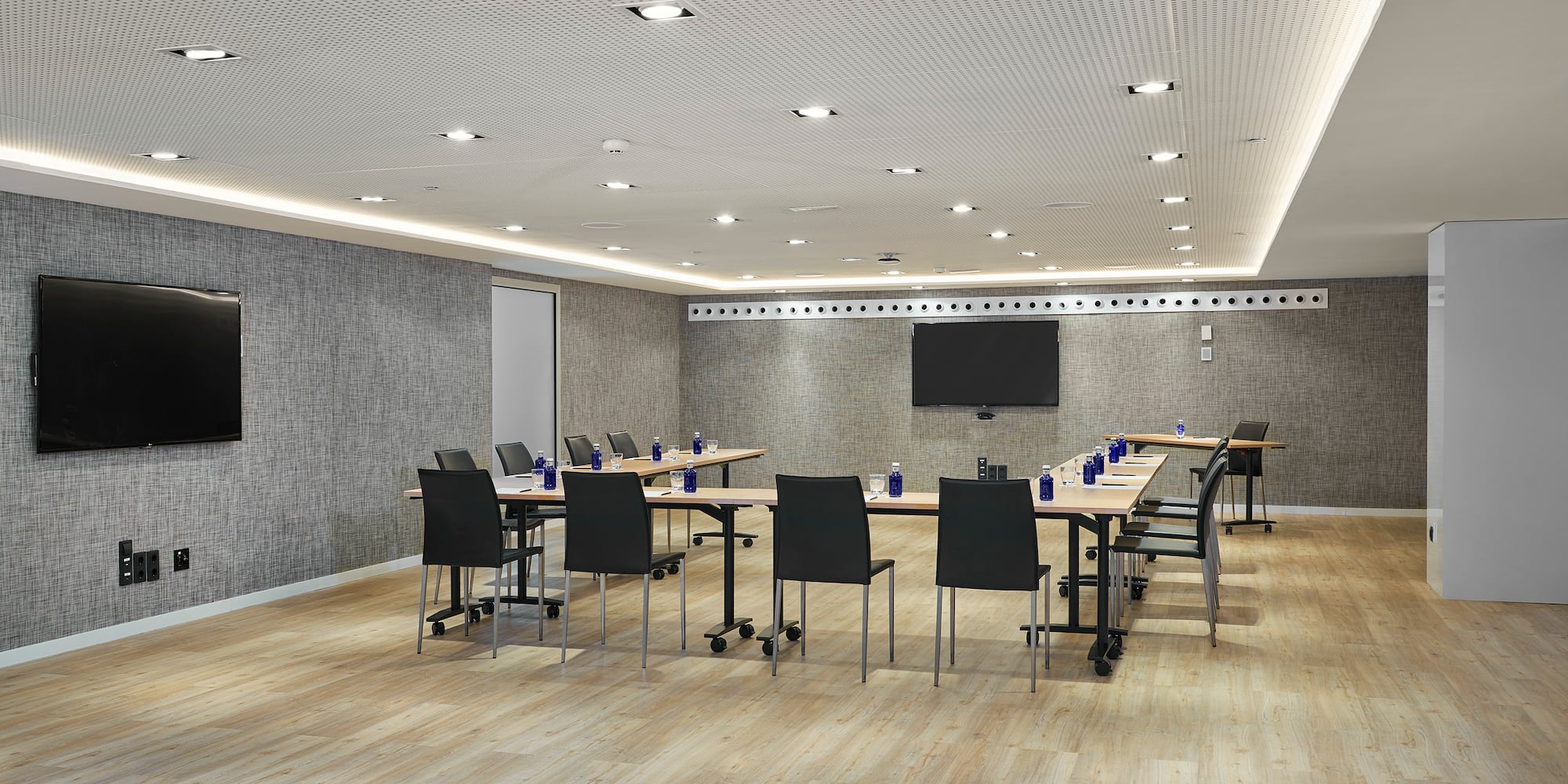 a room with a table and chairs