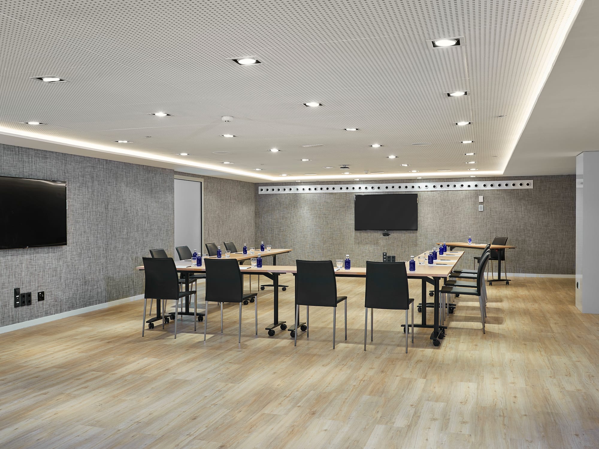 a room with a table and chairs