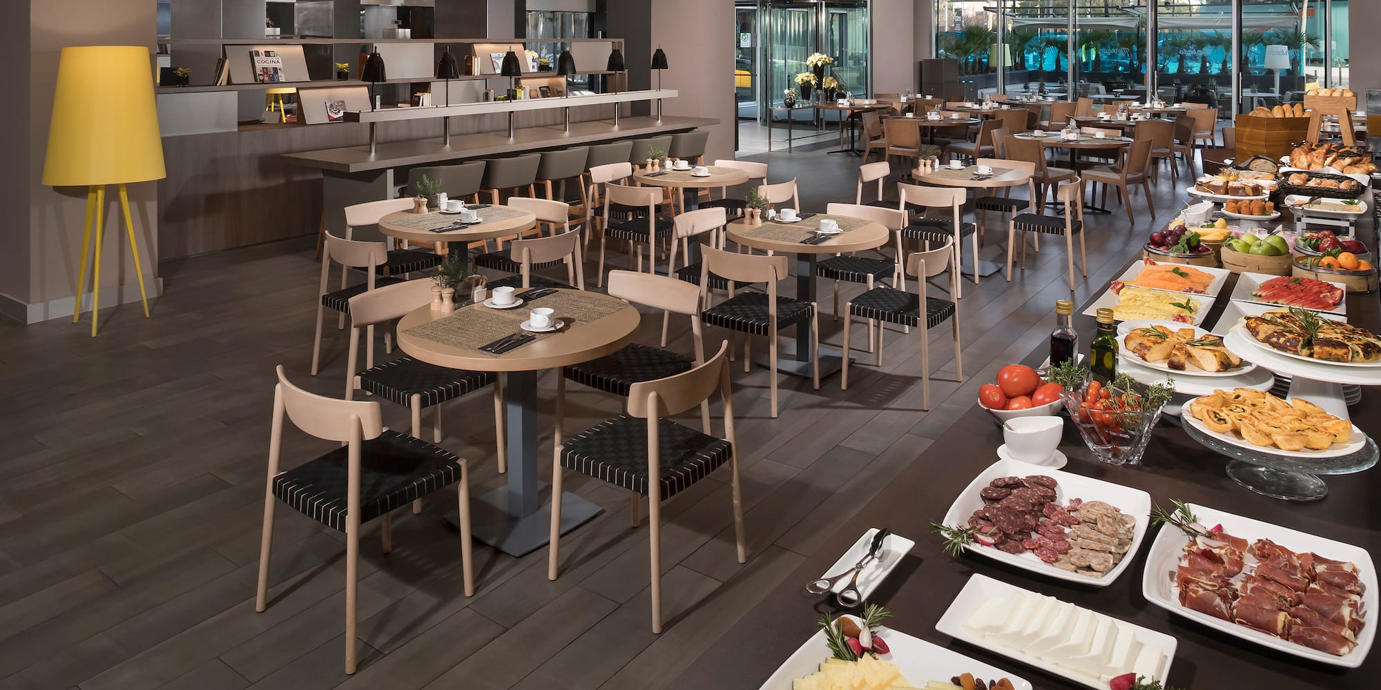 a large room with tables and food