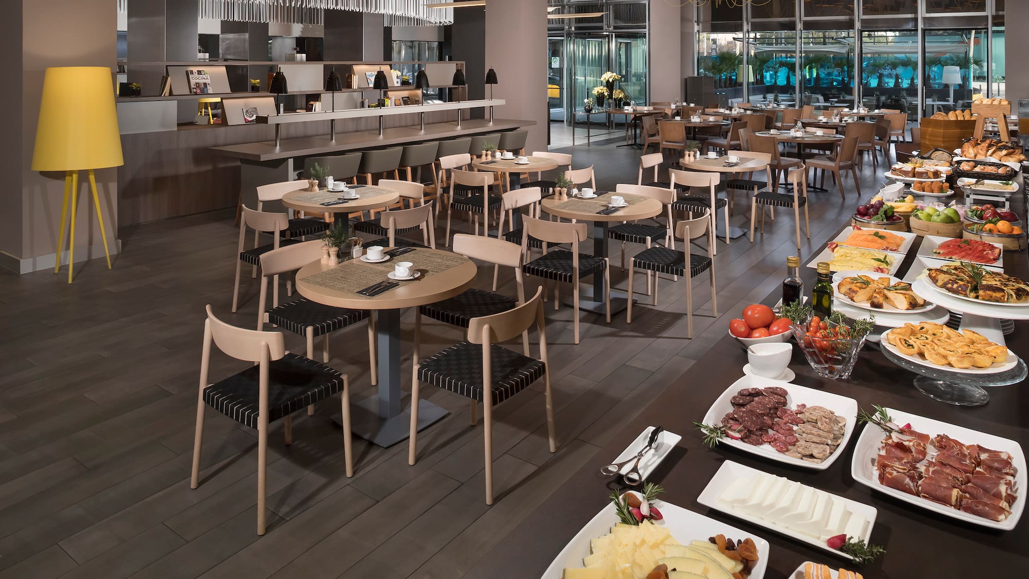 a large room with tables and food