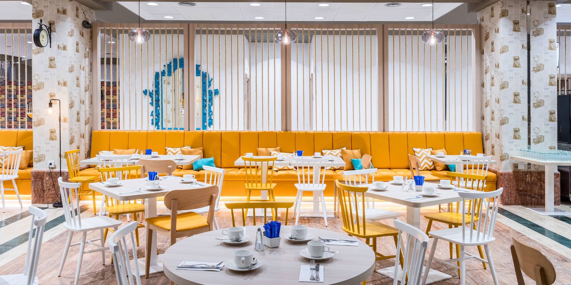 a room with tables and chairs