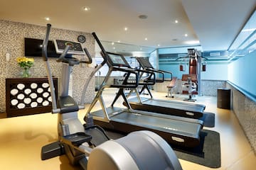 a room with treadmills and exercise equipment