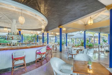 a room with tables and chairs