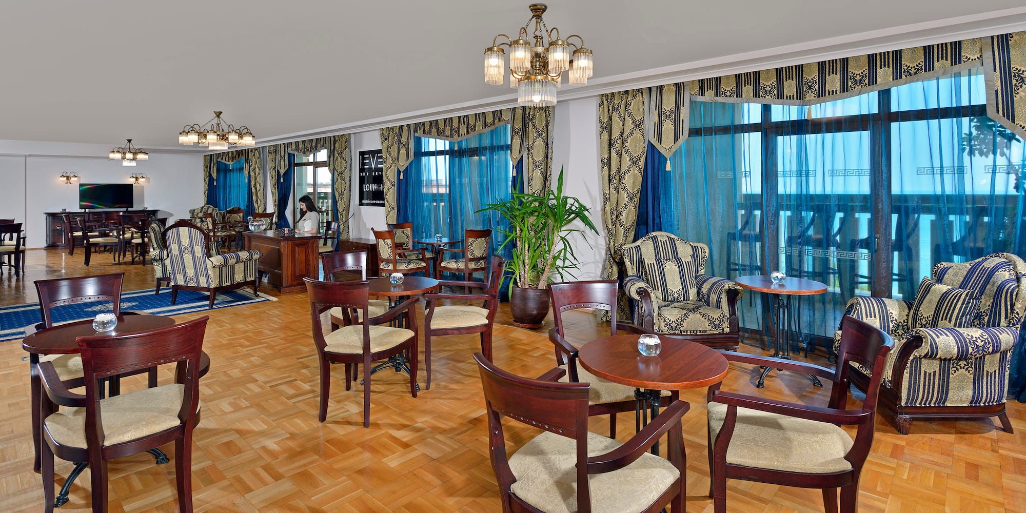 a room with tables and chairs