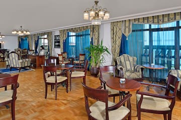a room with tables and chairs