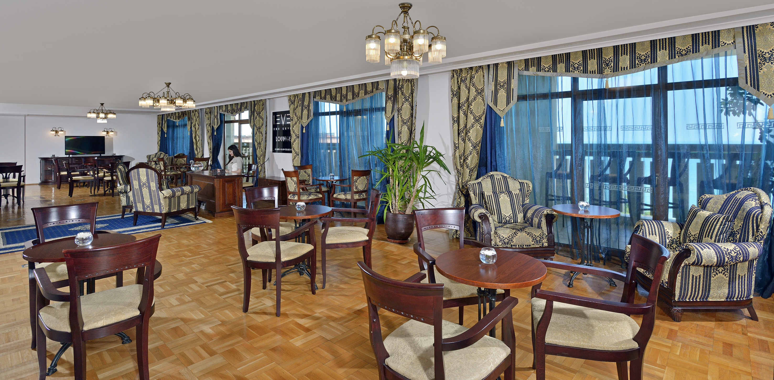 a room with tables and chairs