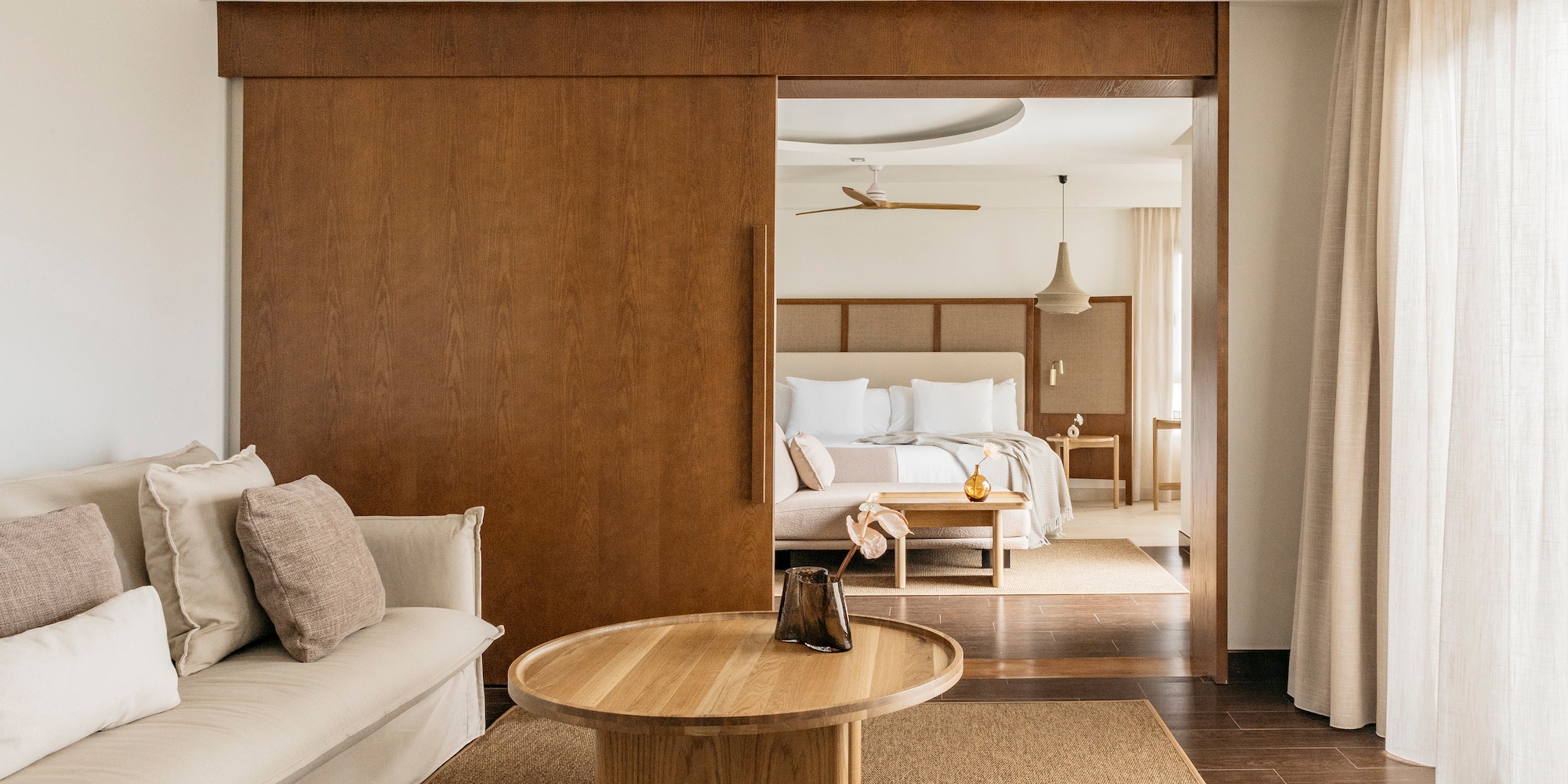 a room with a couch and a bed