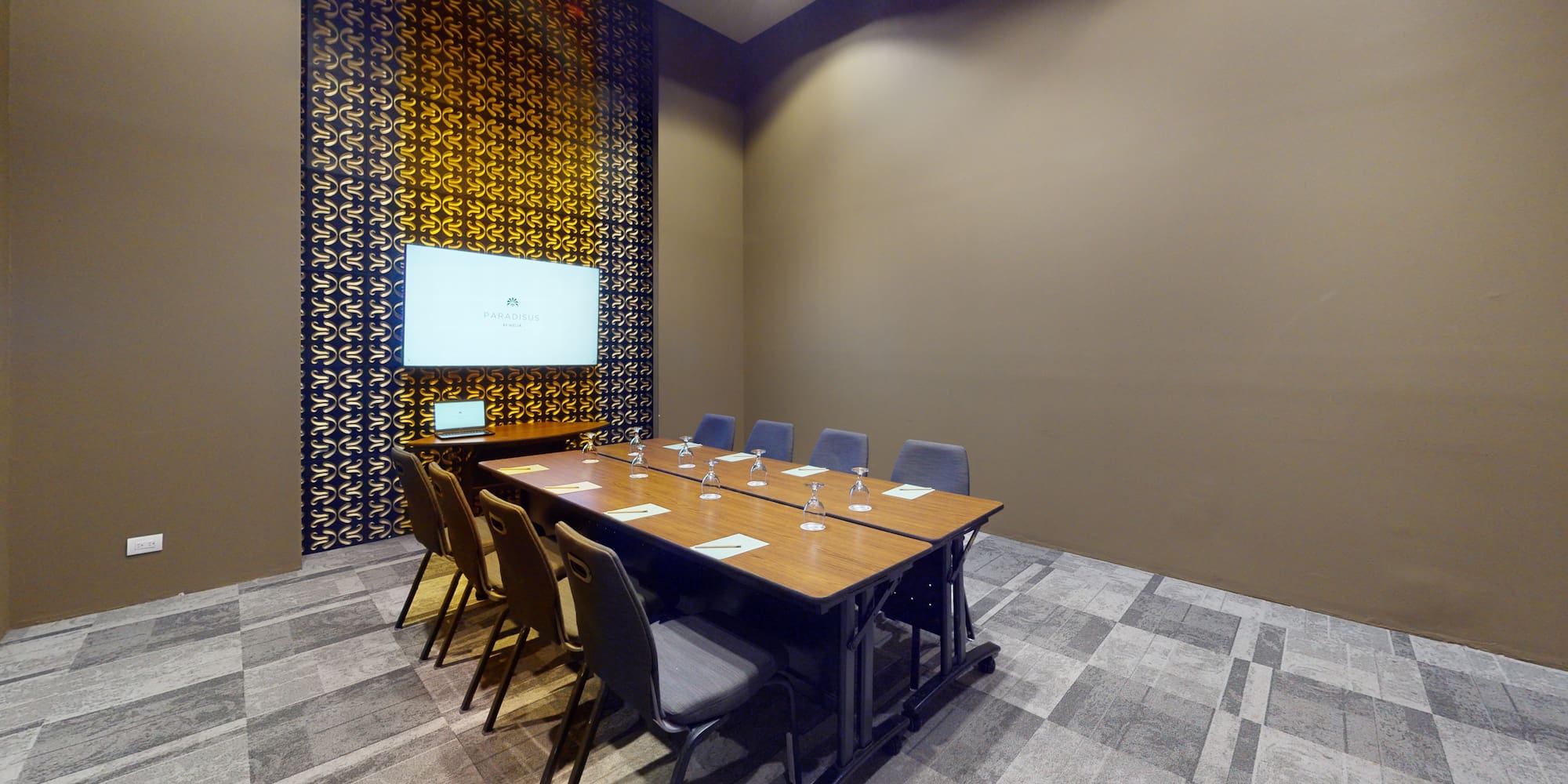 a room with a table and chairs