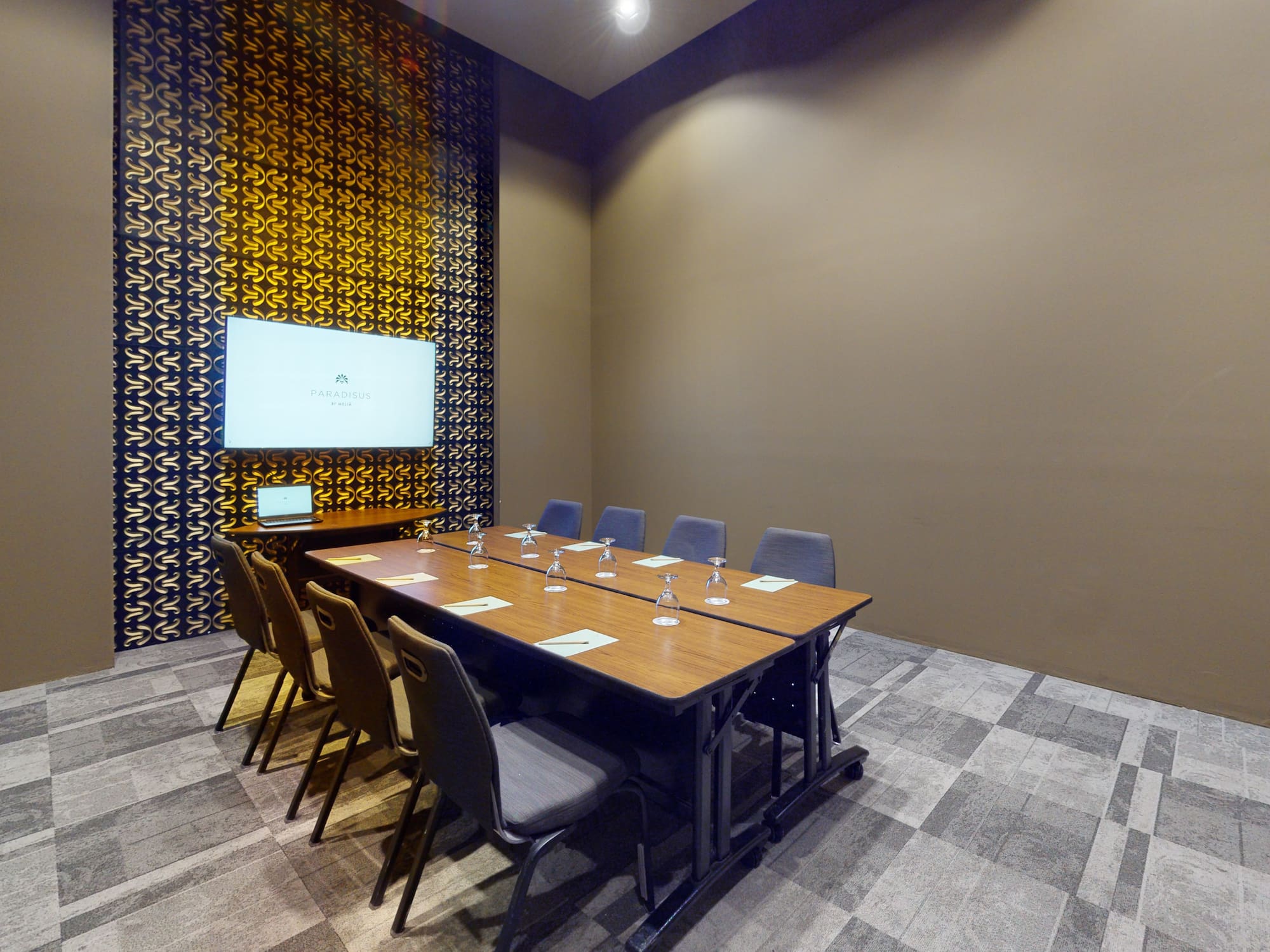 a room with a table and chairs