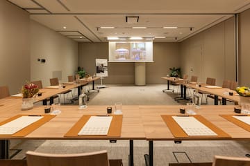 a room with tables and chairs