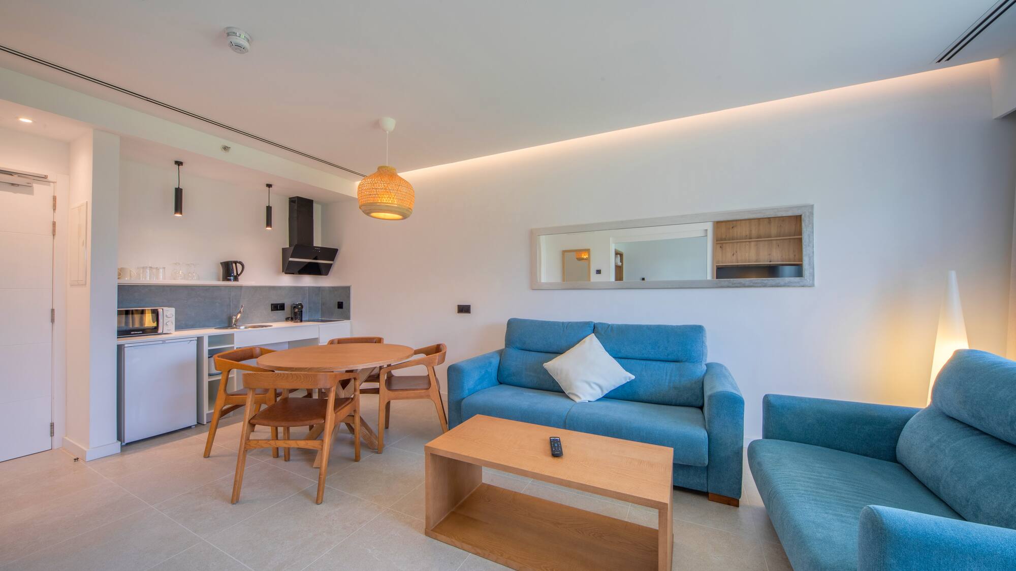 a living room with a table and couch