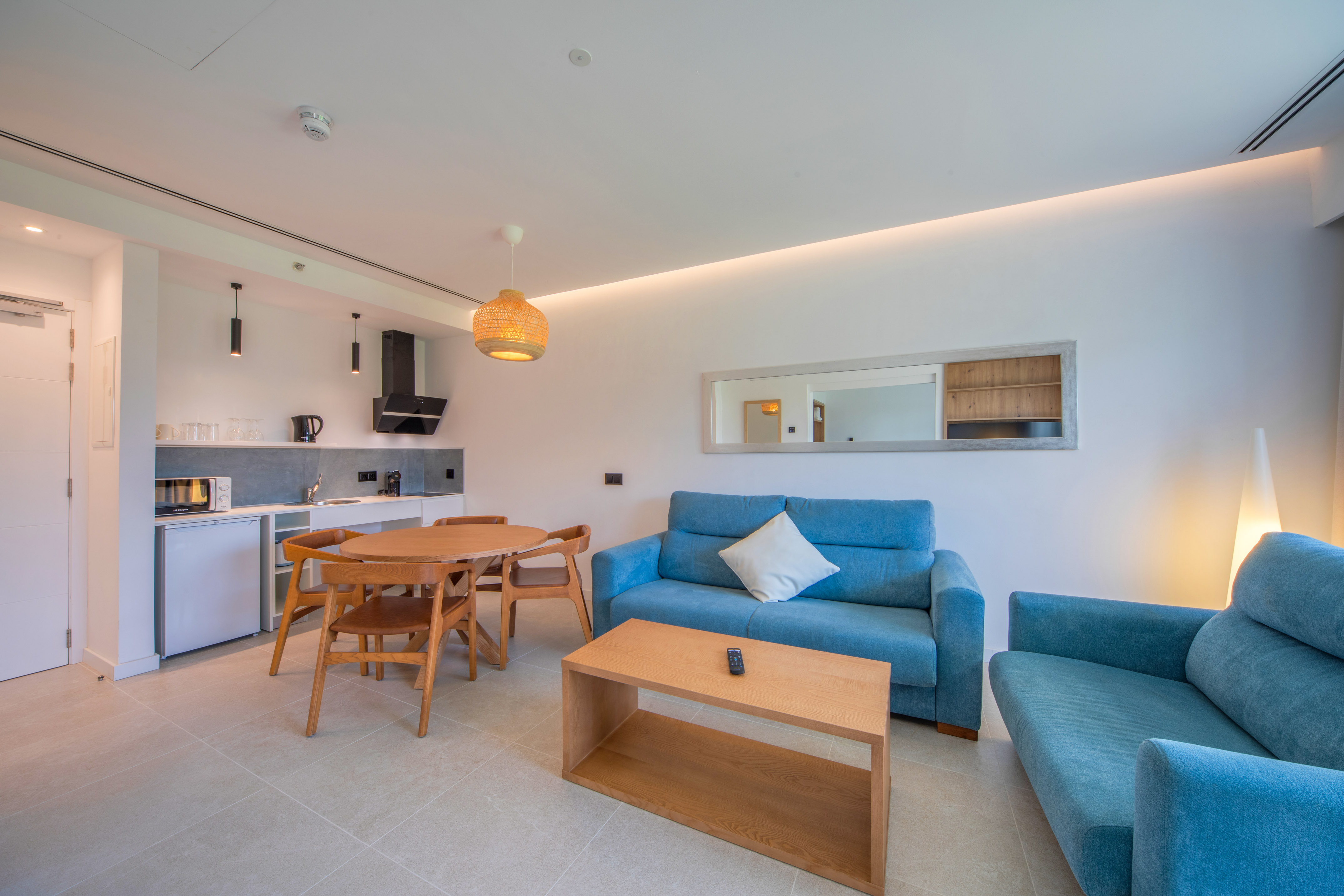 a living room with a table and couch