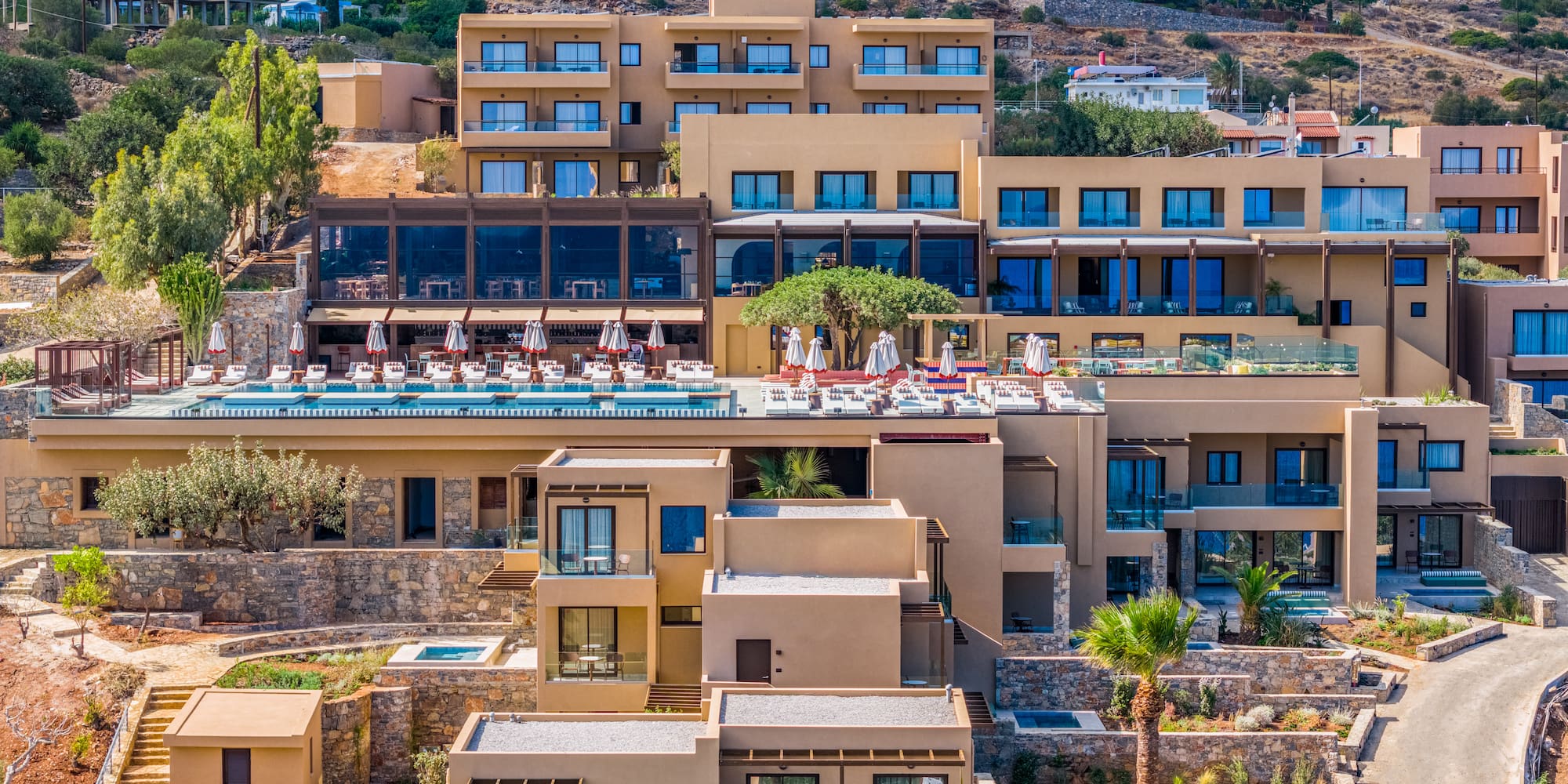 a building with a roof and a pool on top