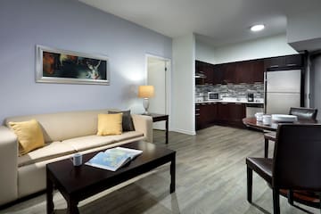 a living room with a couch and coffee table