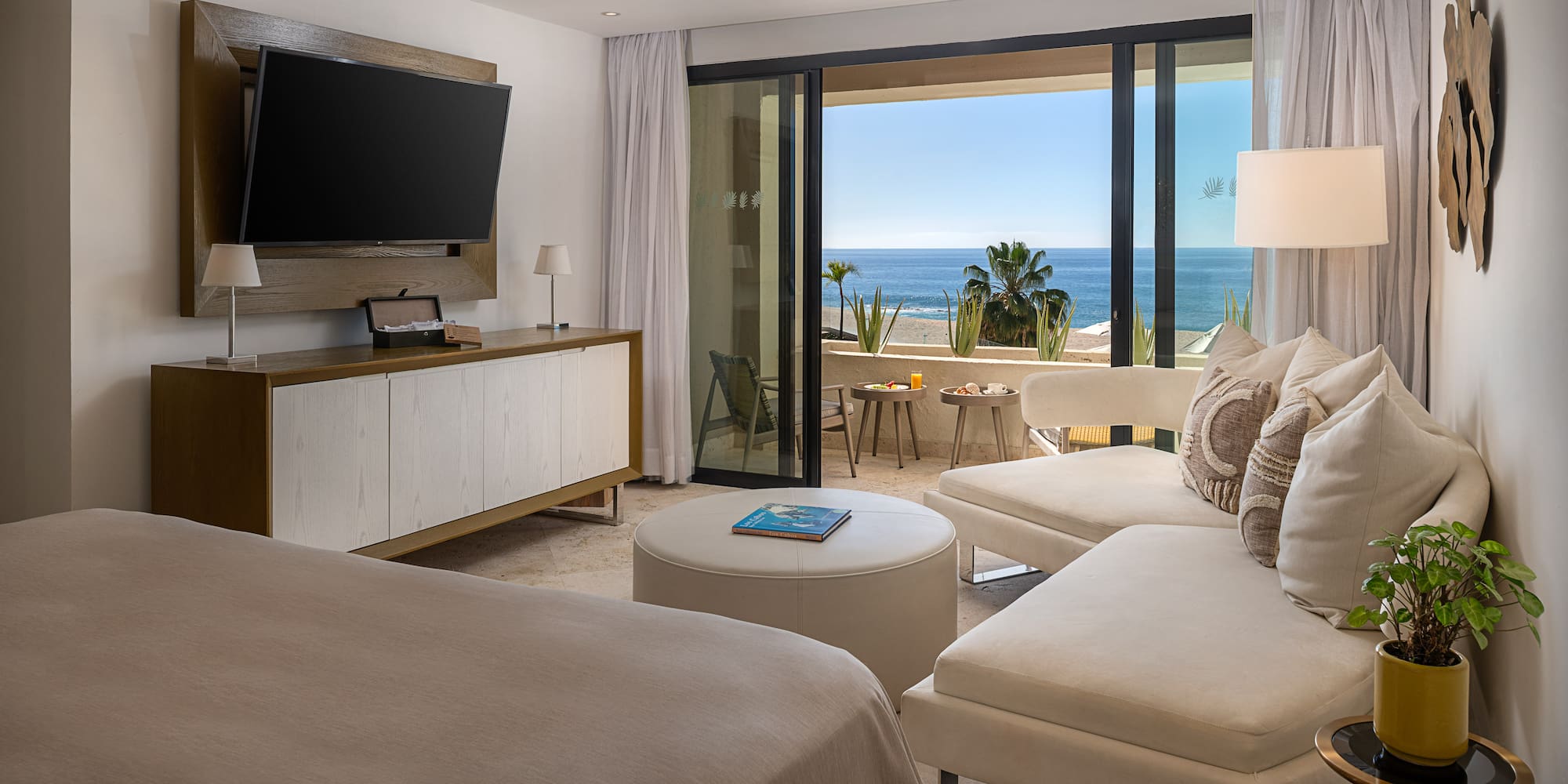 a room with a television and a bed