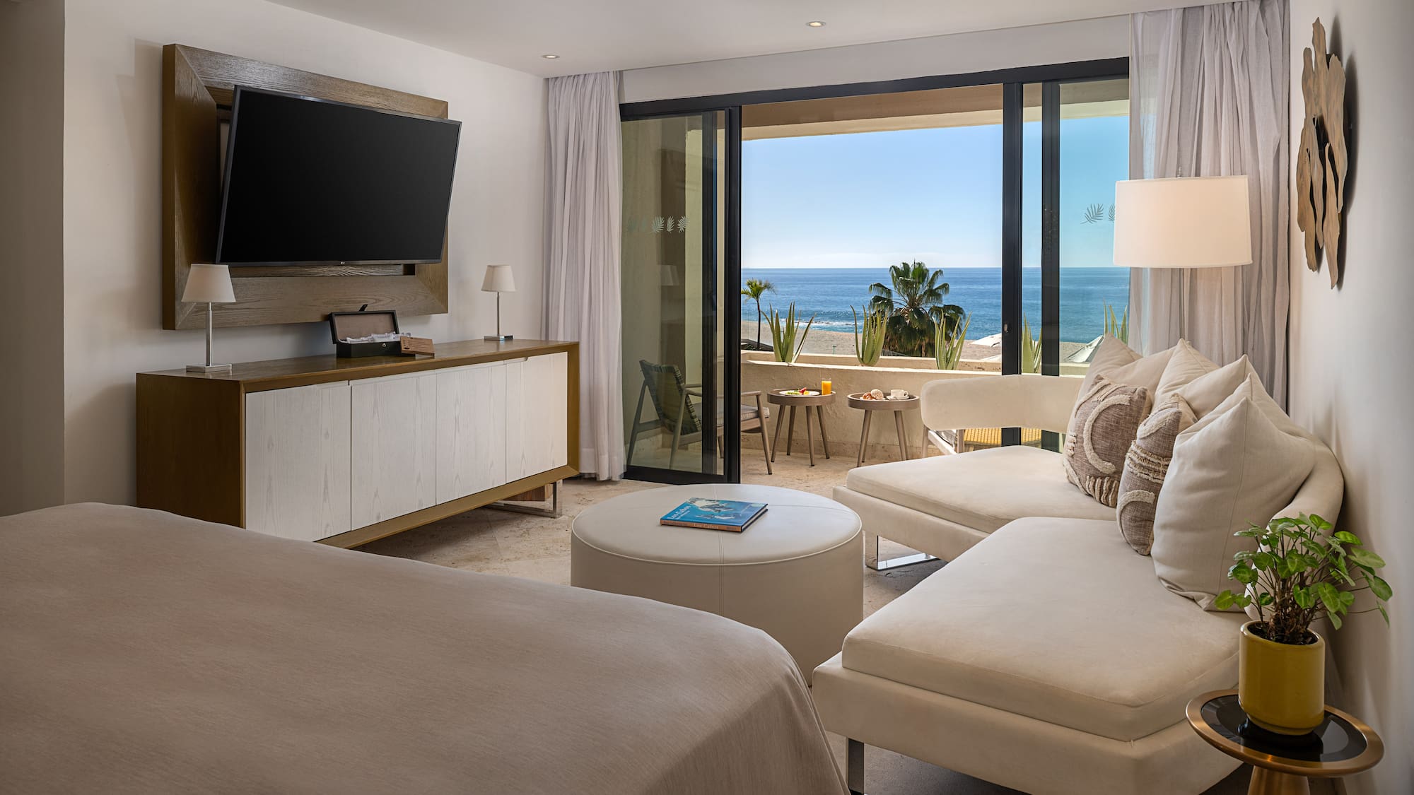 a room with a television and a bed