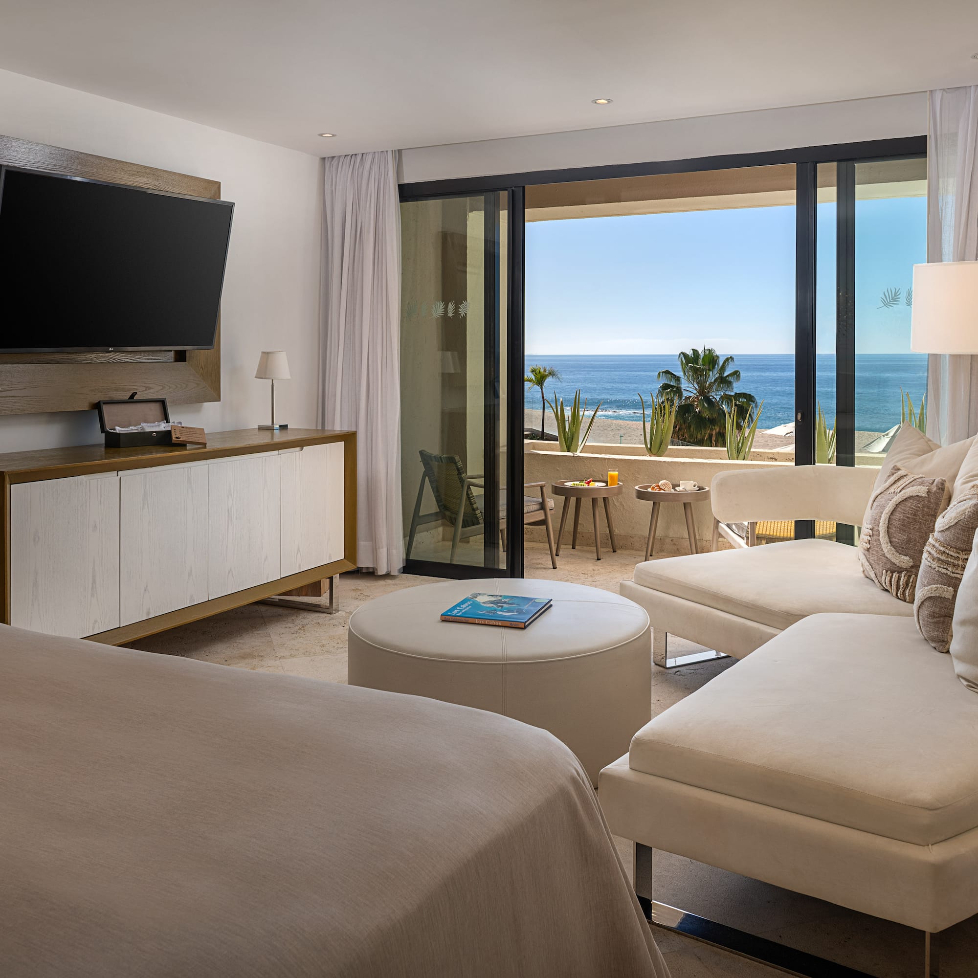 a room with a television and a bed