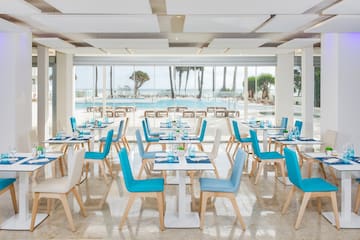 a room with tables and chairs