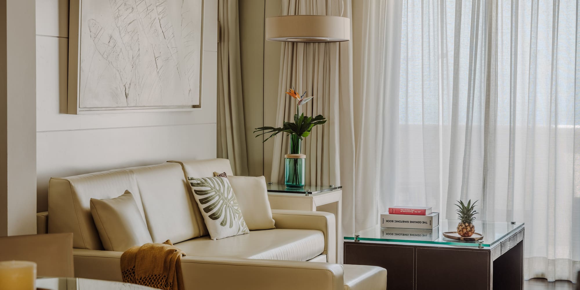 a living room with a couch and a table