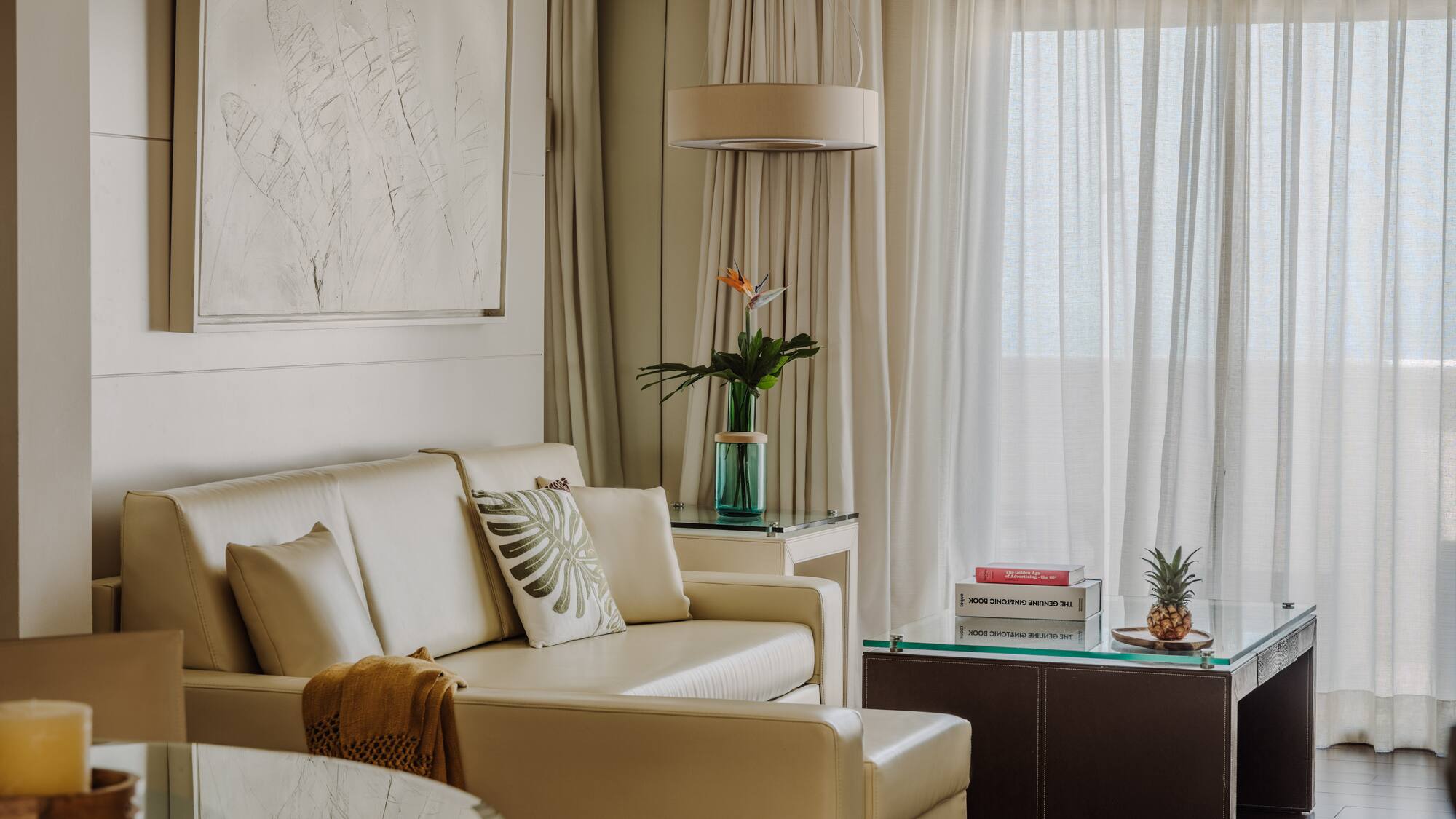 a living room with a couch and a table