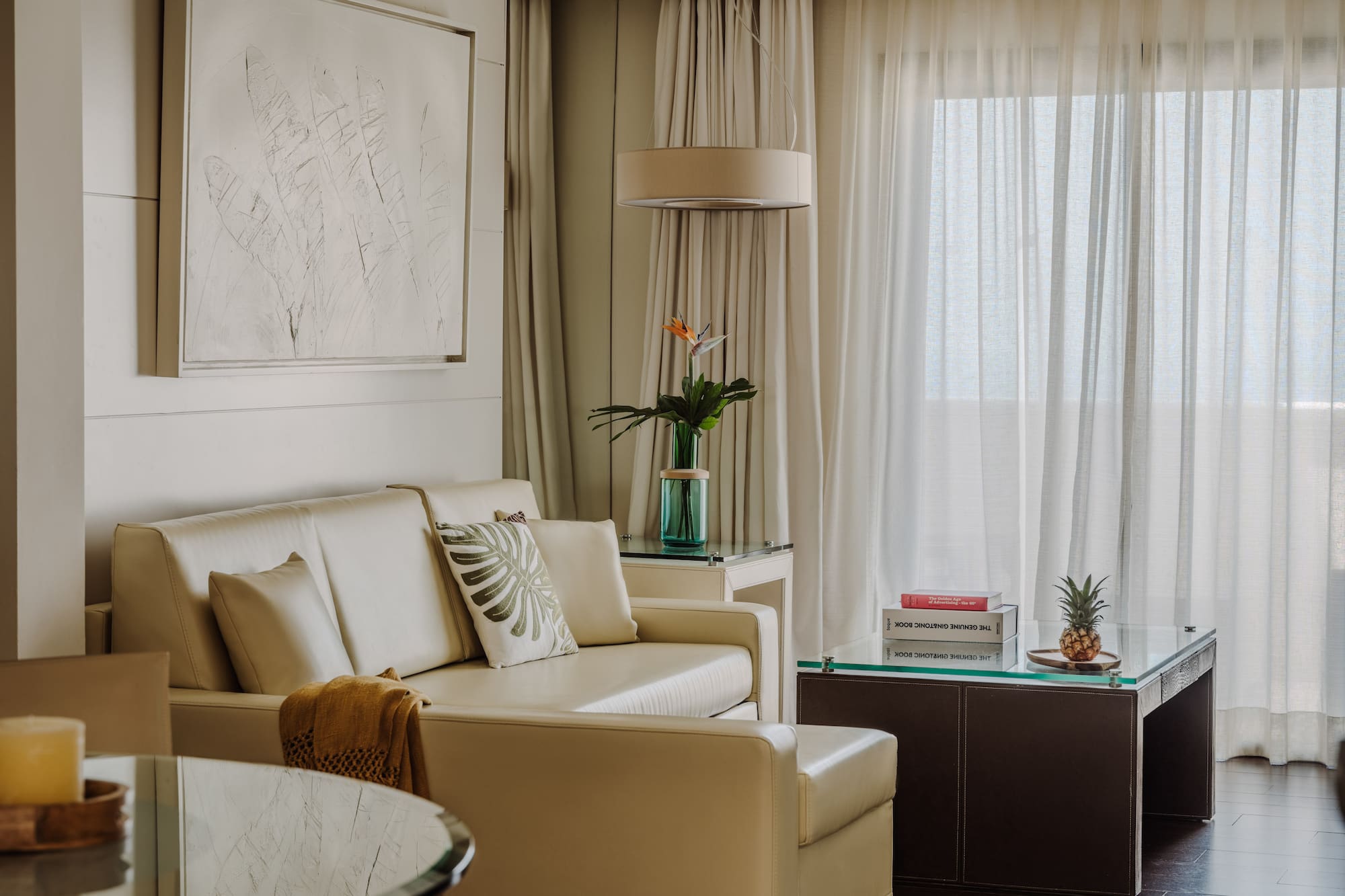 a living room with a couch and a table