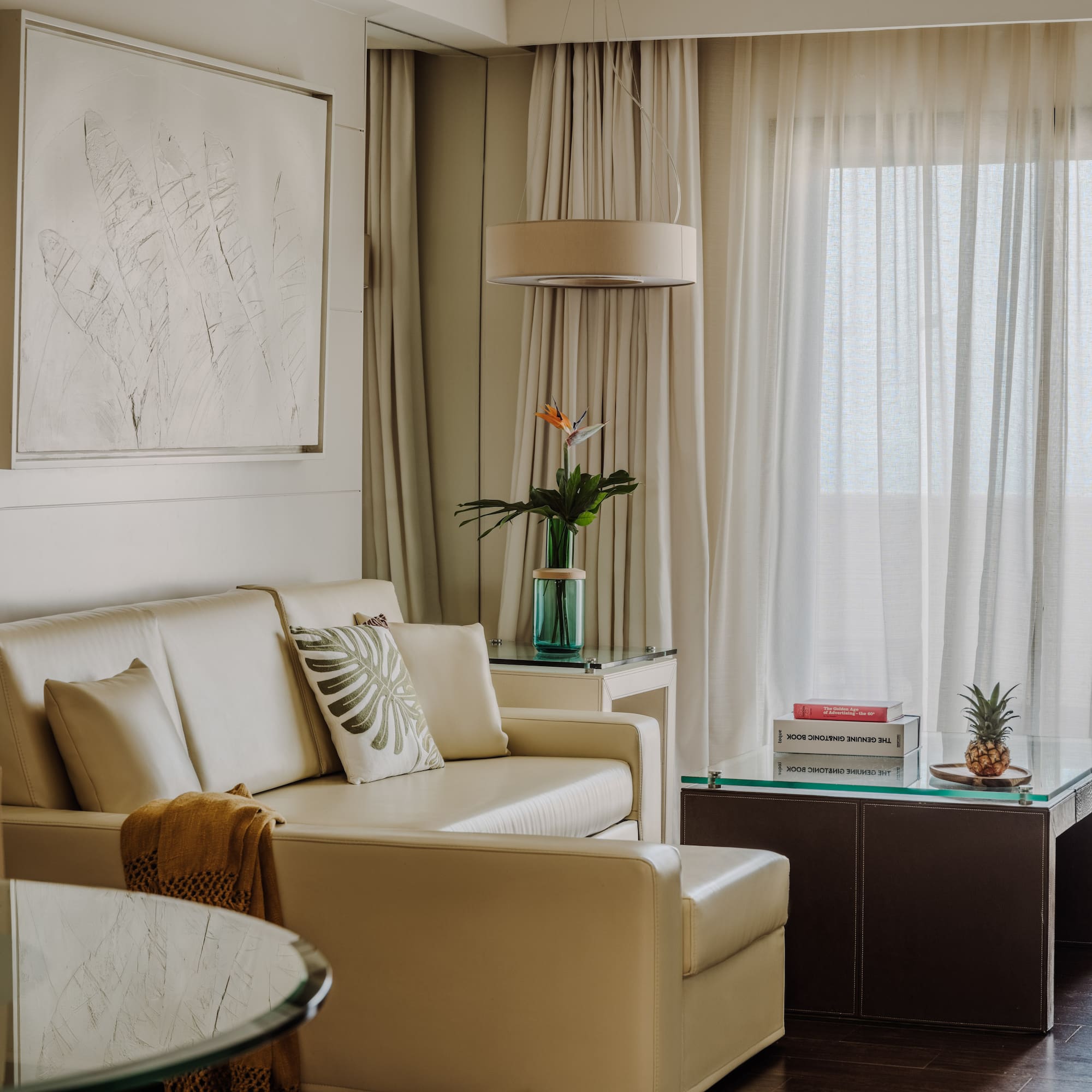 a living room with a couch and a table