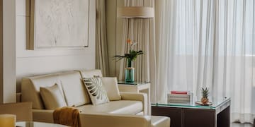 a living room with a couch and a table