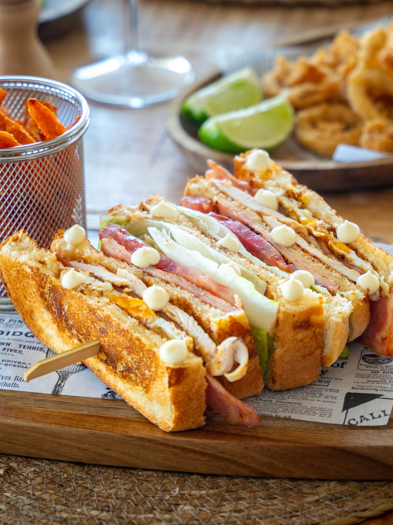 a sandwich on a wooden board