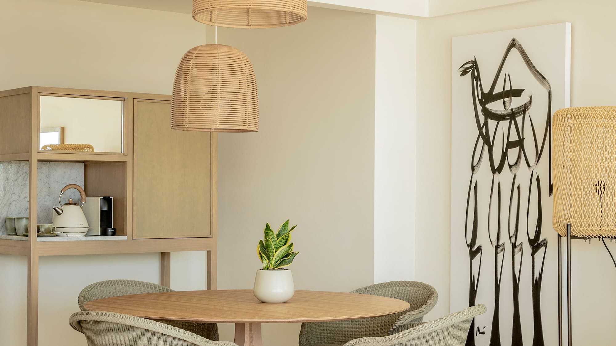 a room with a table and chairs