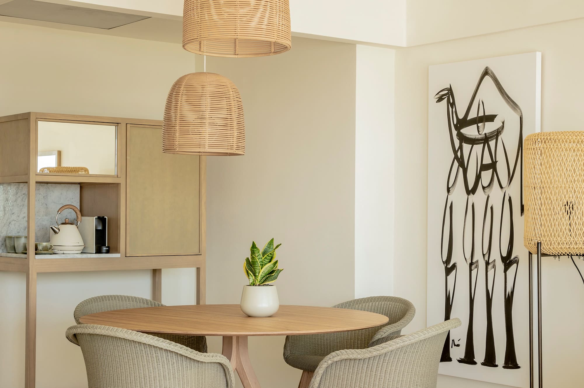 a room with a table and chairs