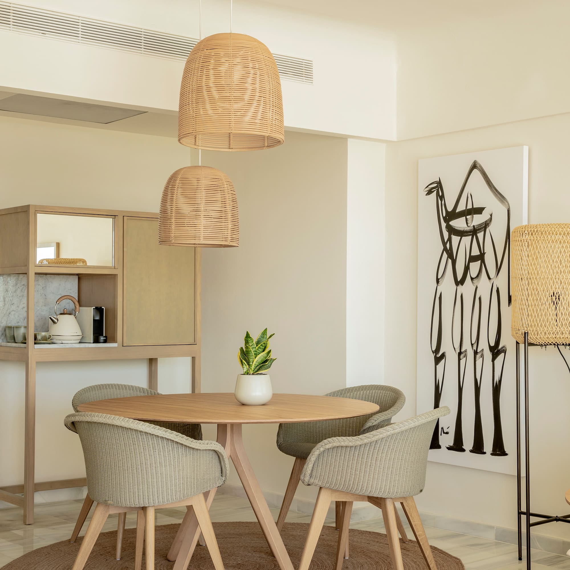 a room with a table and chairs