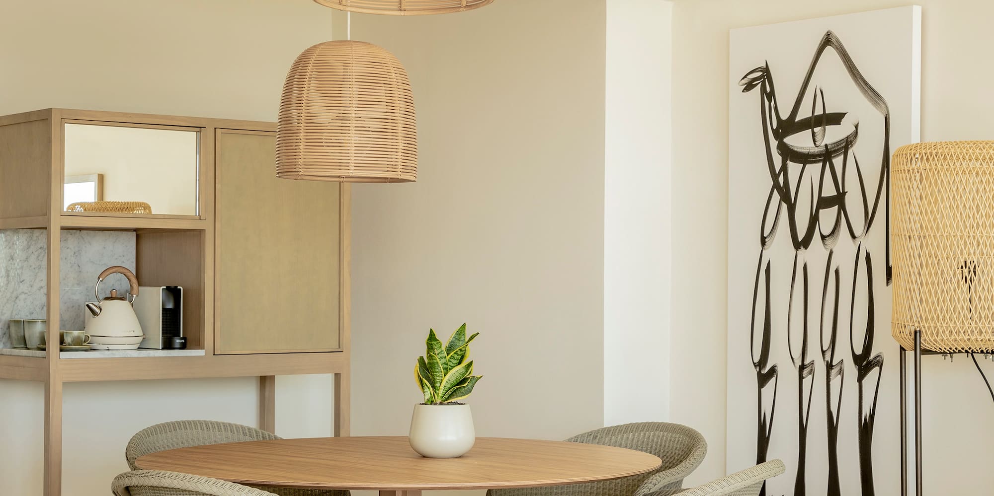 a room with a table and chairs