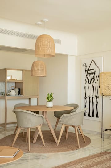a room with a table and chairs