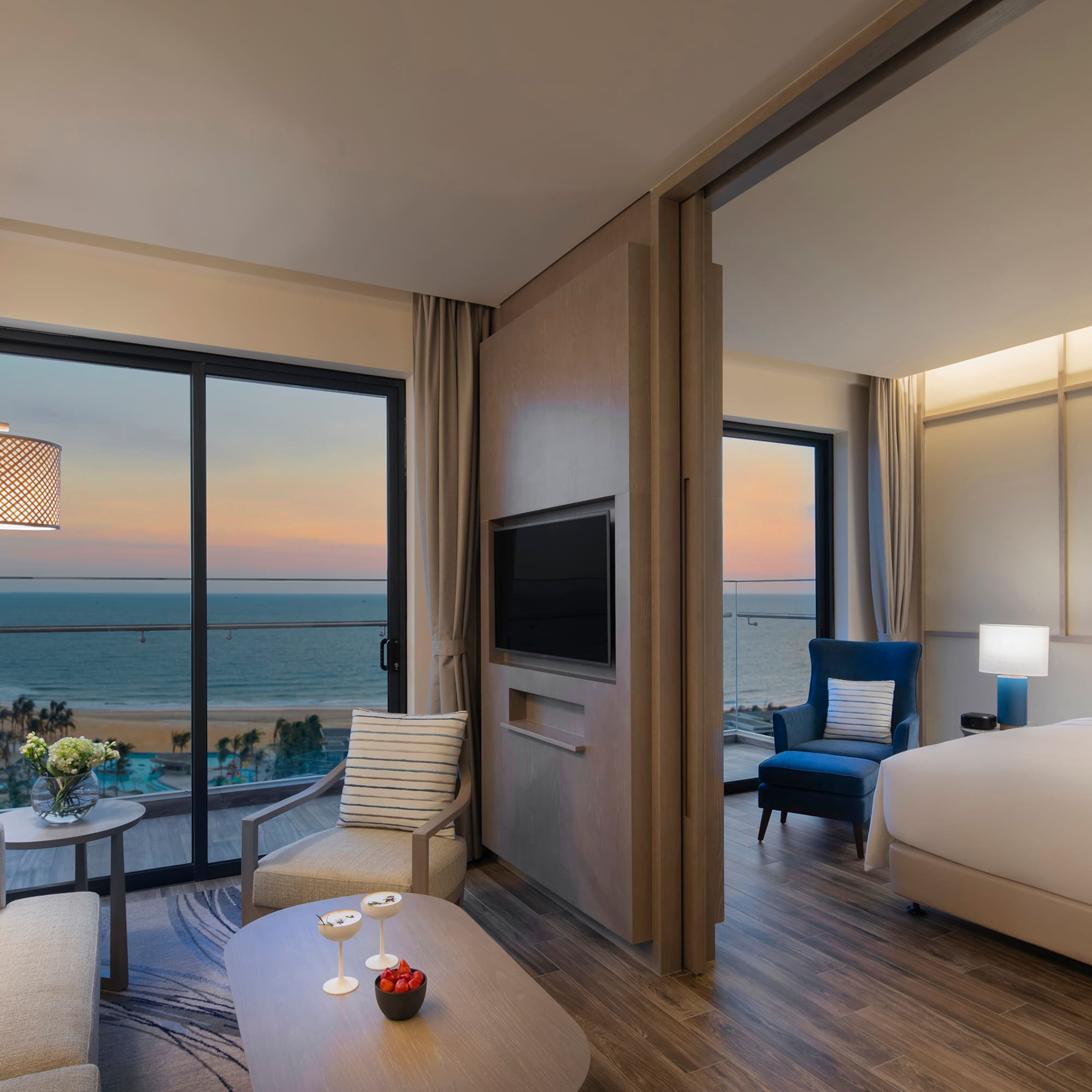 a room with a television and a bed