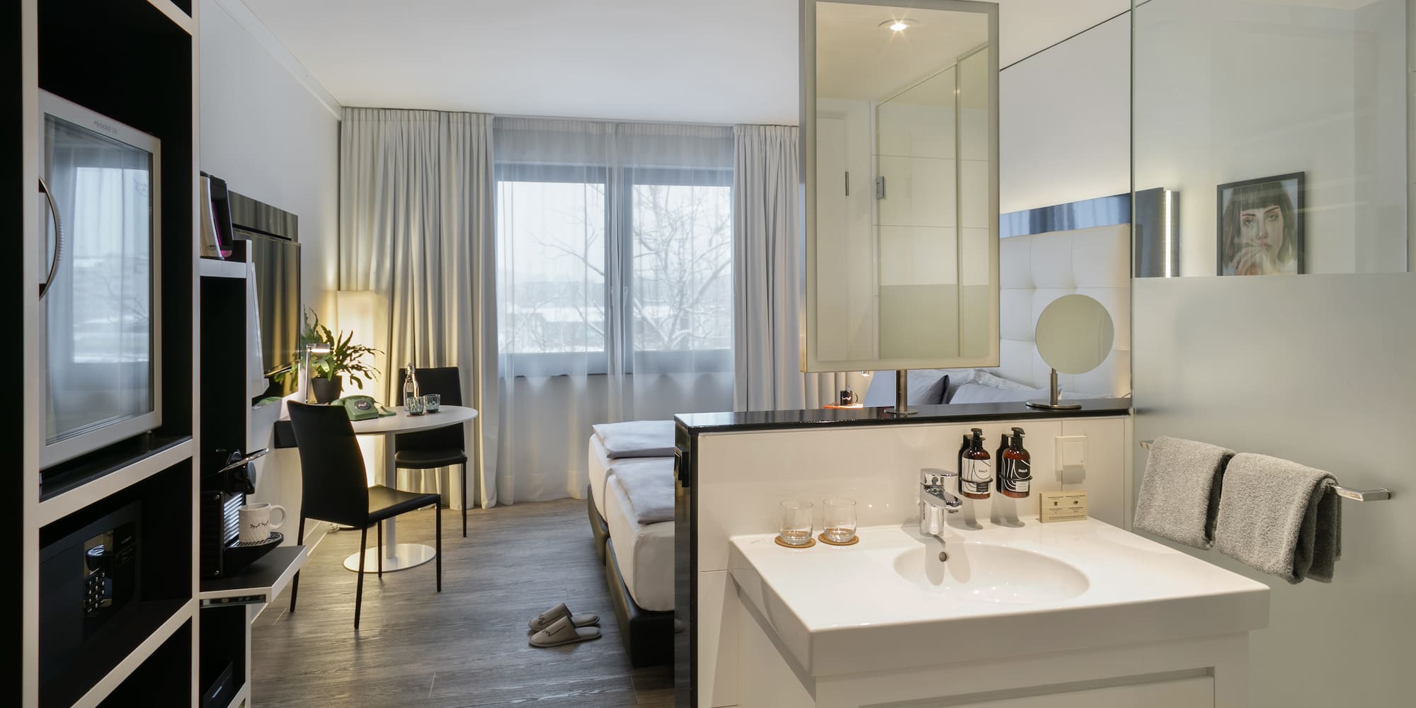 a room with a bed and a mirror