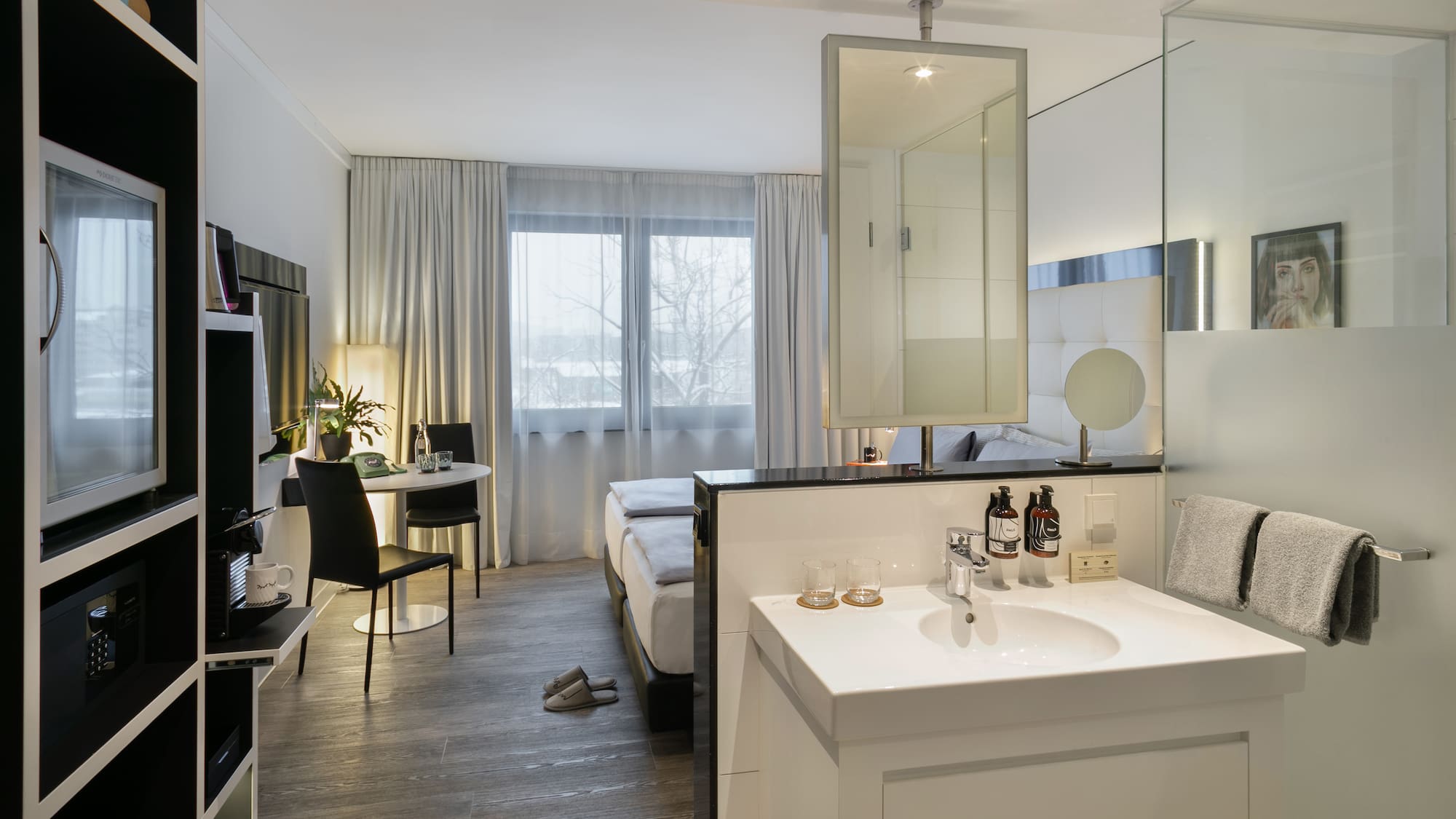 a room with a bed and a mirror