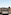Seville rooftop terrace with Giralda tower view and outdoor lounge setup.
