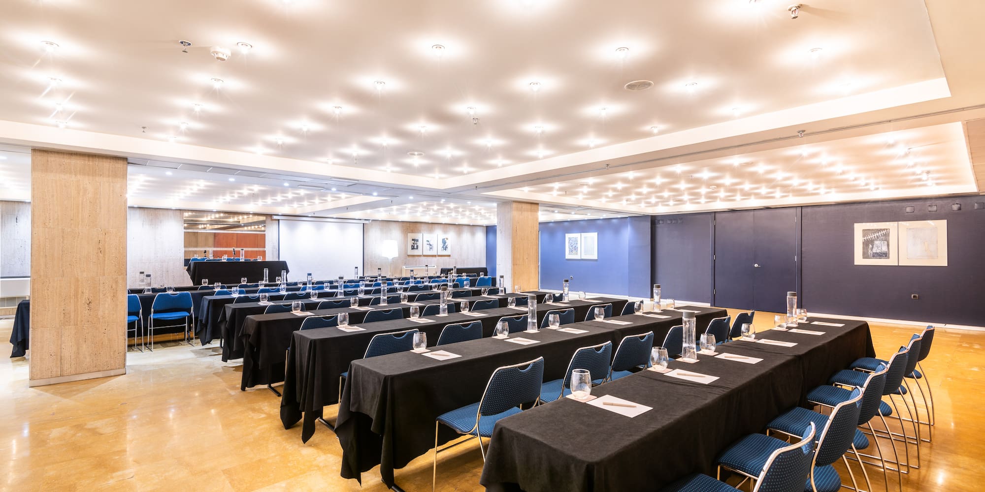 a room with tables and chairs