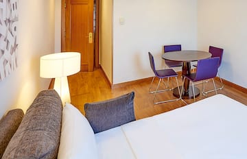 a room with a table and chairs