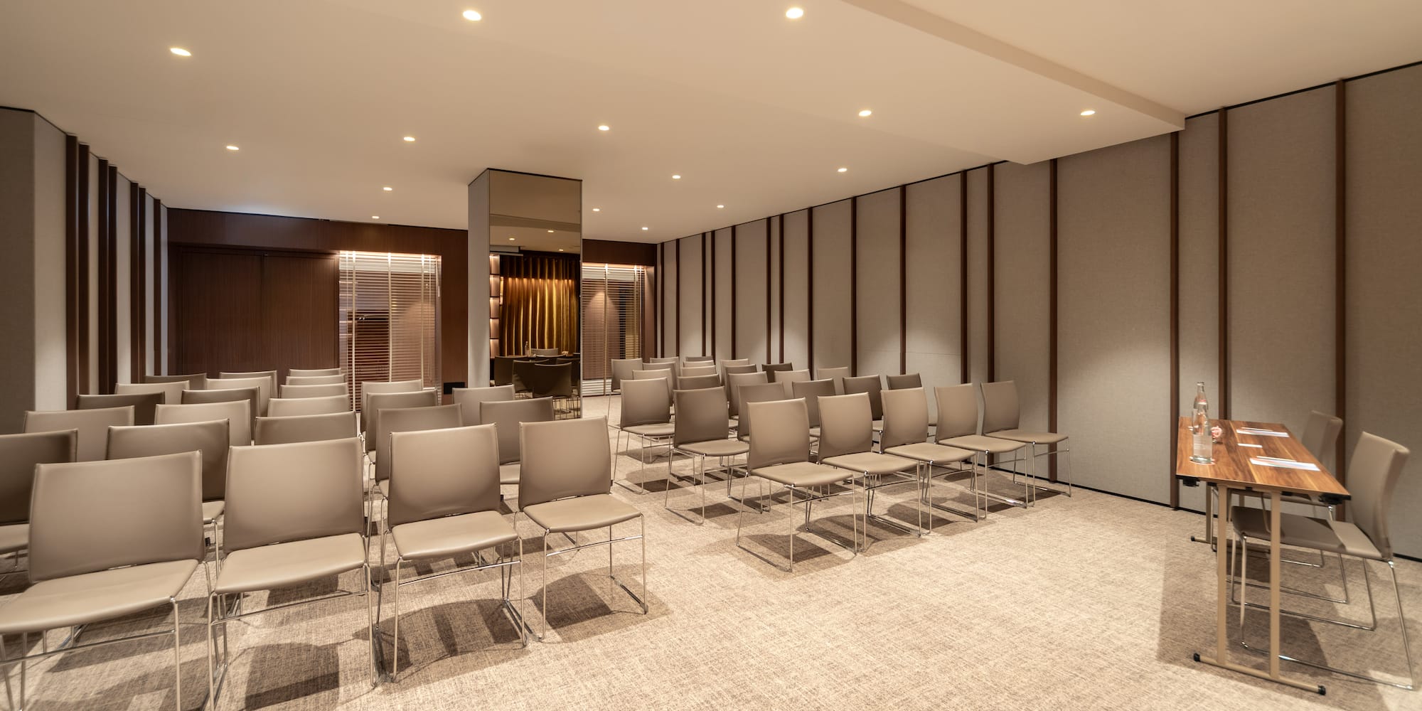 a room with chairs and a podium