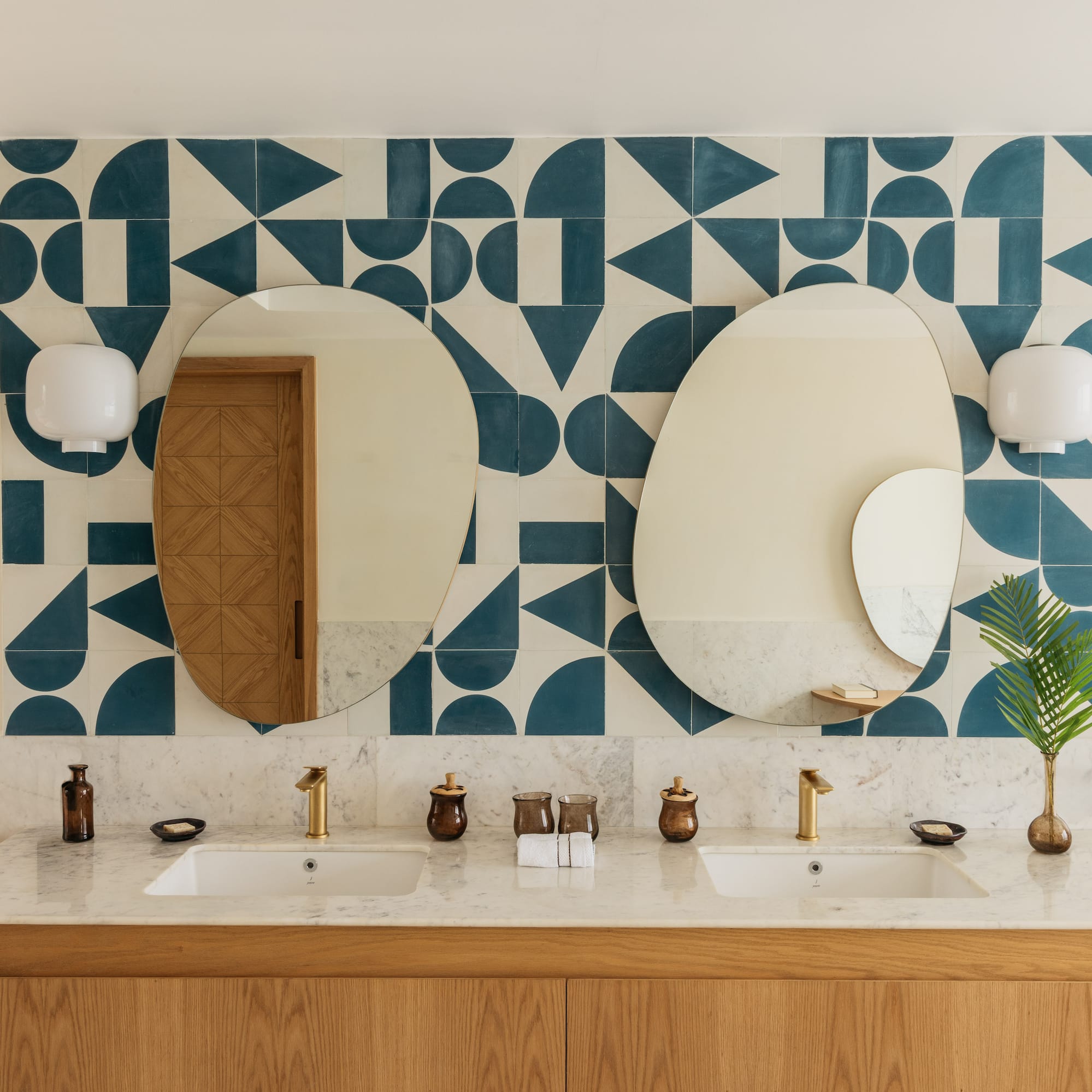 a bathroom with a mirror and a wall