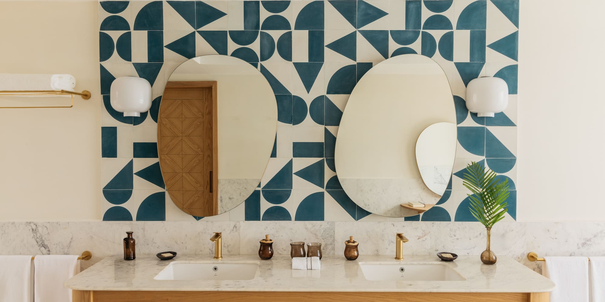 a bathroom with a mirror and a wall