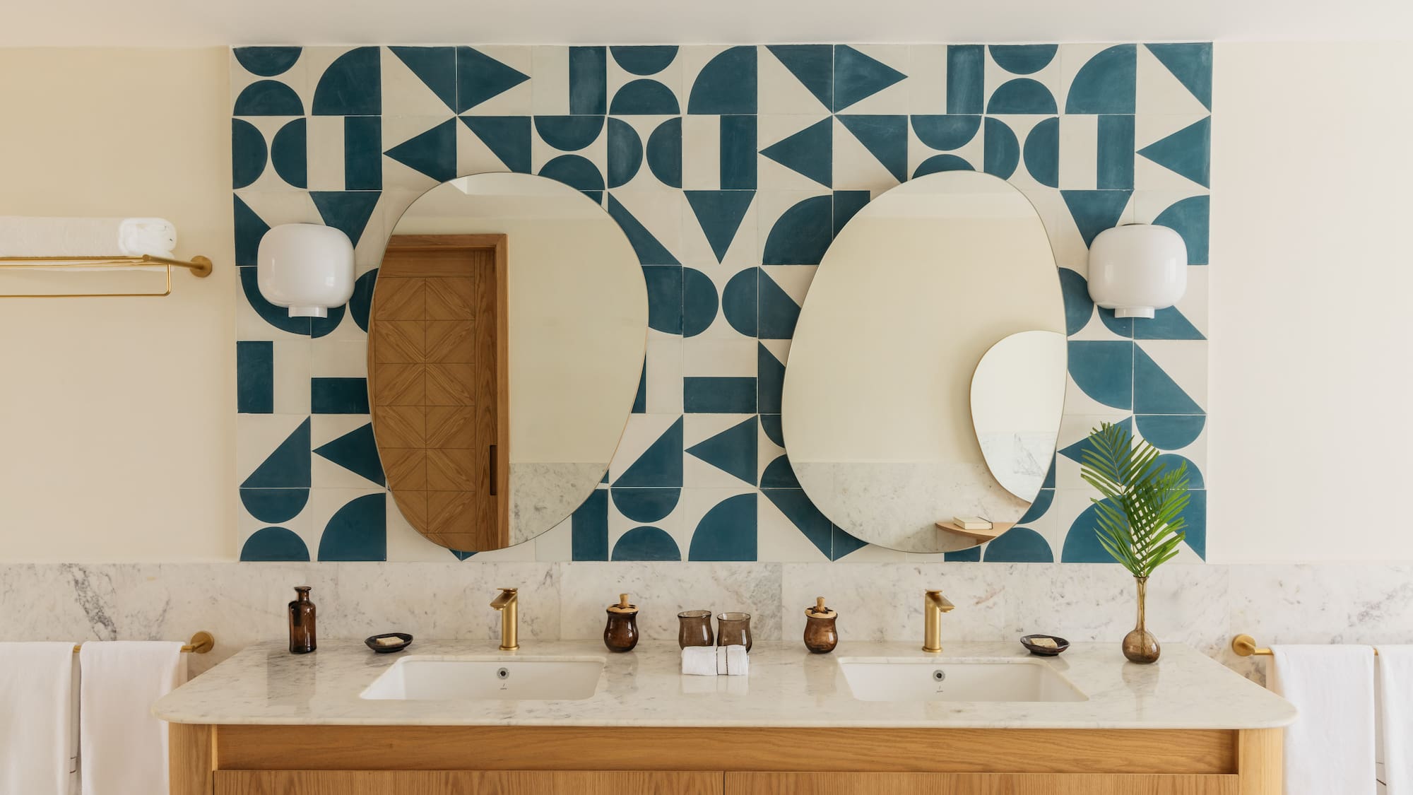 a bathroom with a mirror and a wall