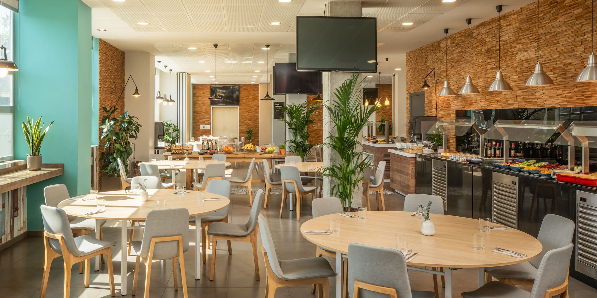 a large room with tables and chairs