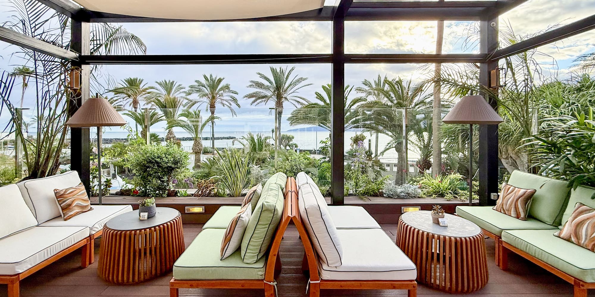 a patio with chairs and tables