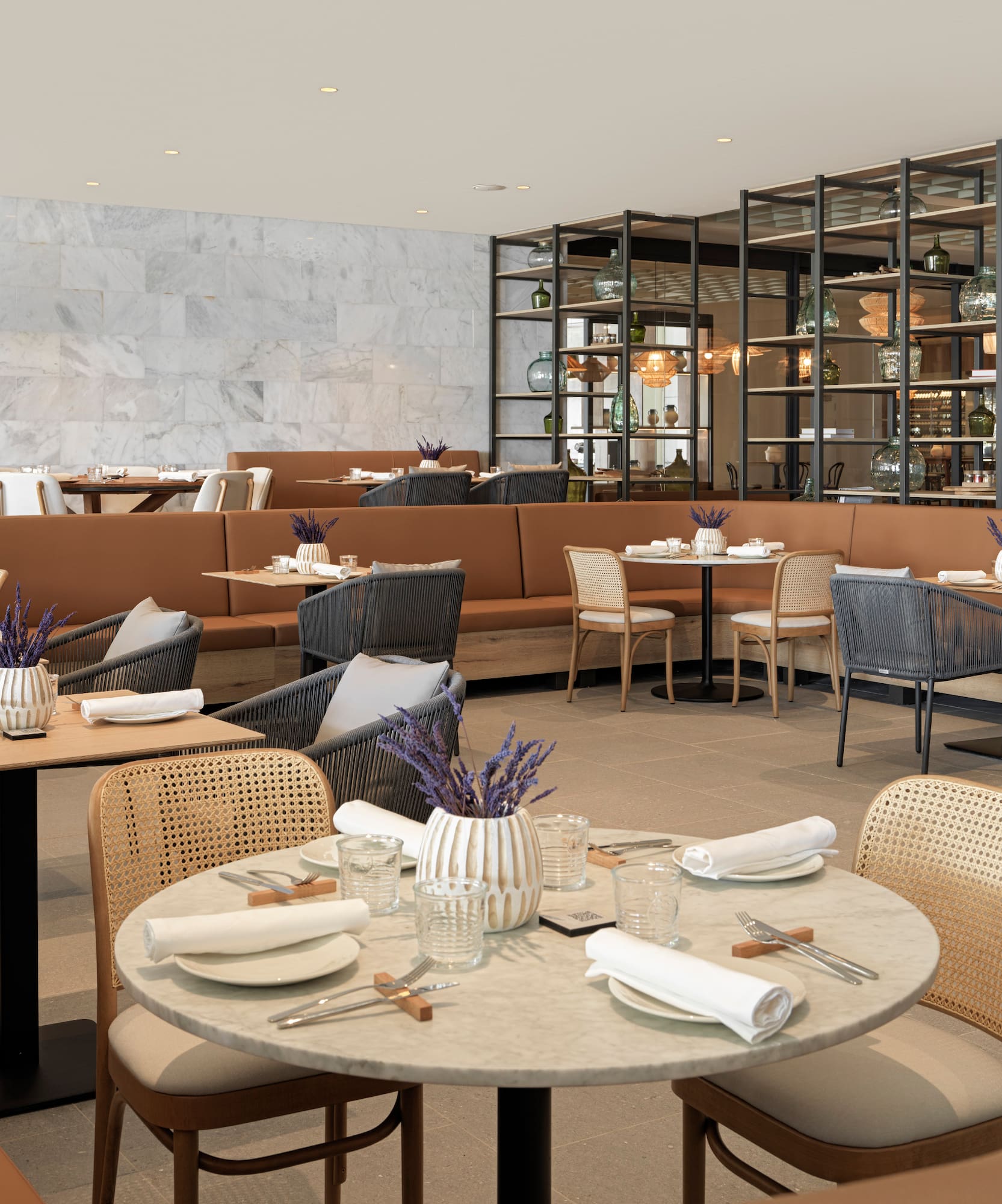 a restaurant with tables and chairs