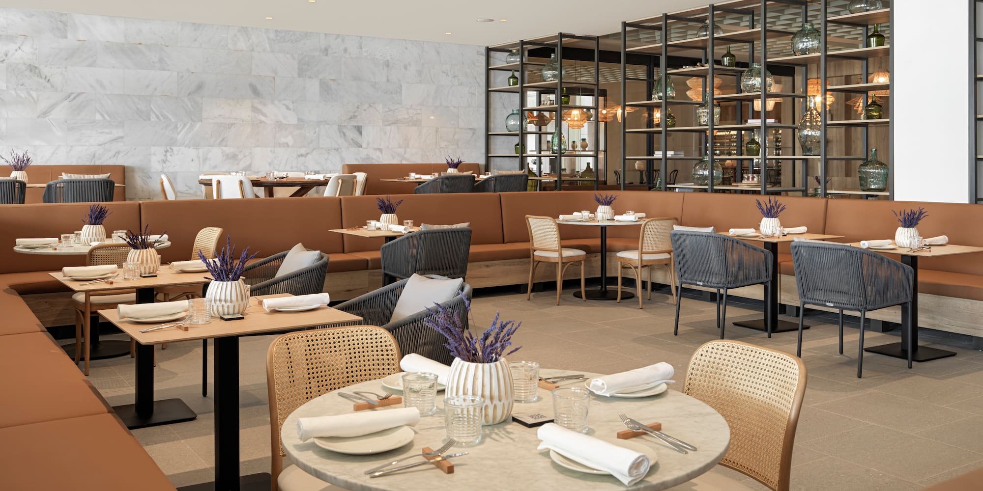 a restaurant with tables and chairs