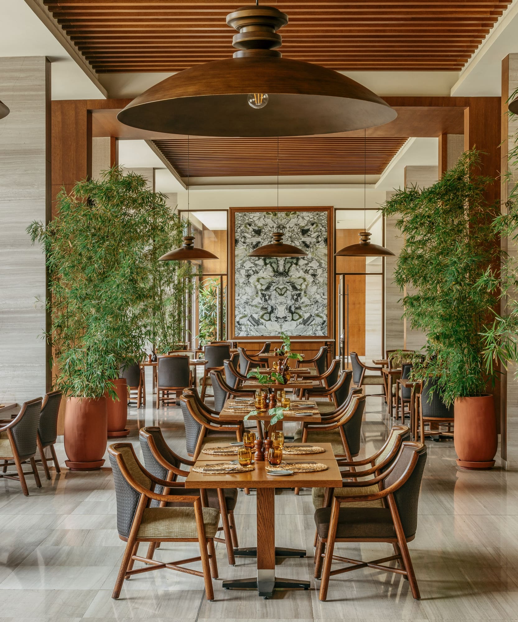 a restaurant with tables and chairs
