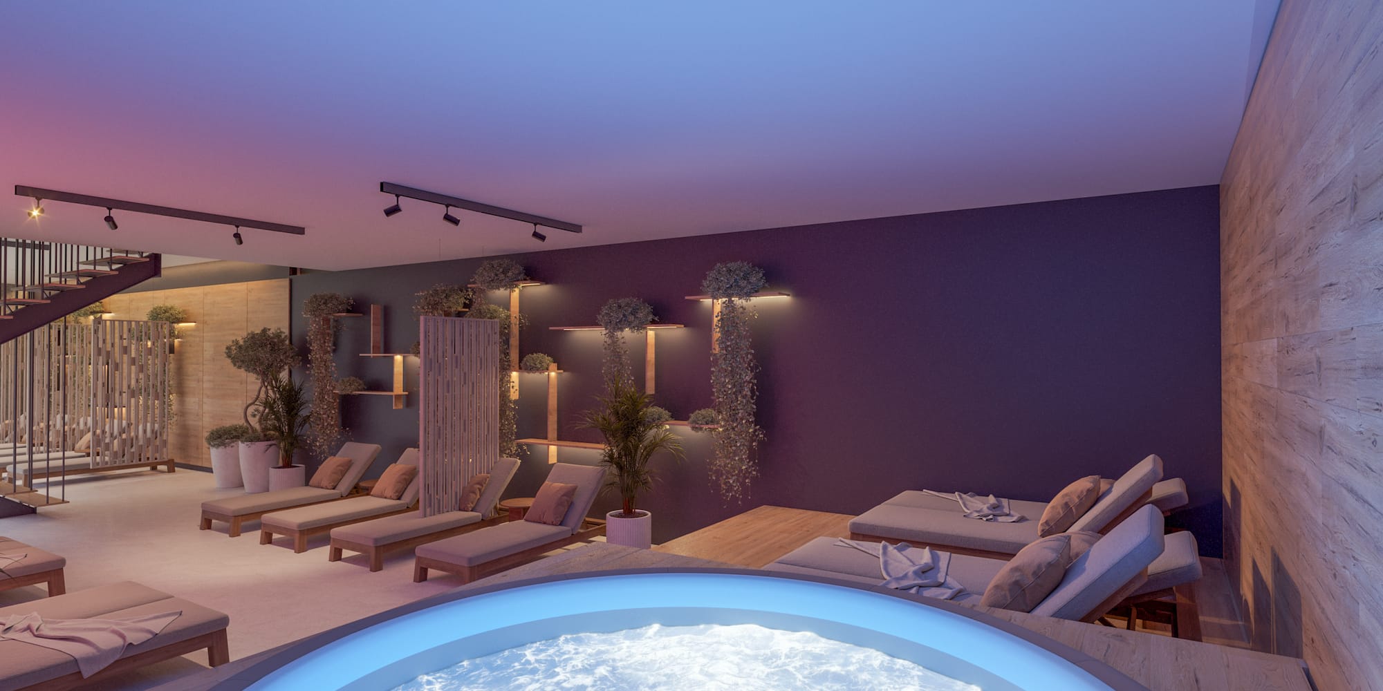 a room with a hot tub and lounge chairs