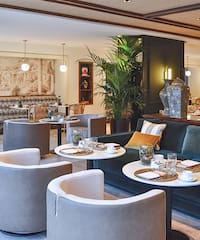 a room with tables and chairs